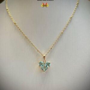Gold Heart Pendant Necklace with Blue Gemstone